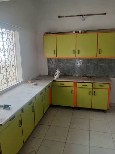 Renovated 2 bed drawing lounge 1st floor portion for rent tiled flooring America kitchen tiled washrooms 24 hours water and electricity separate gate and meters West open