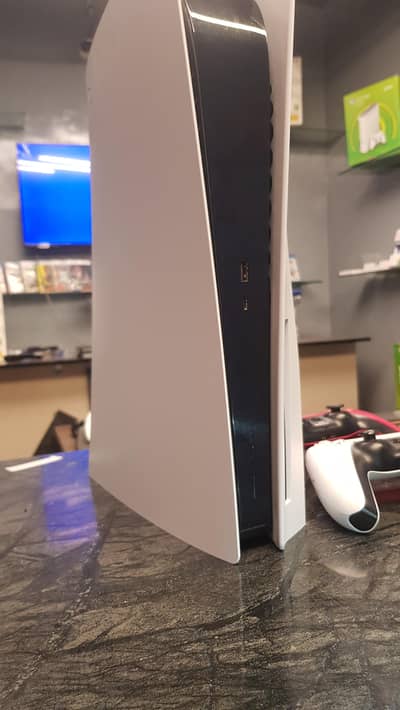 PlayStation 5 (Fat)with 2 DualSense Controllers (White & Red)