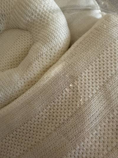 Zubaidas knitted baby bed