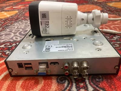 4-Channel XVR DH-XVR1B04-I & 4MP PoE IP CameraDH-IPC-HFW1439T1L1-PV