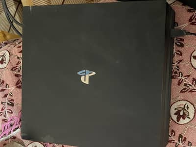 Play station 4 pro 1 TB used like new