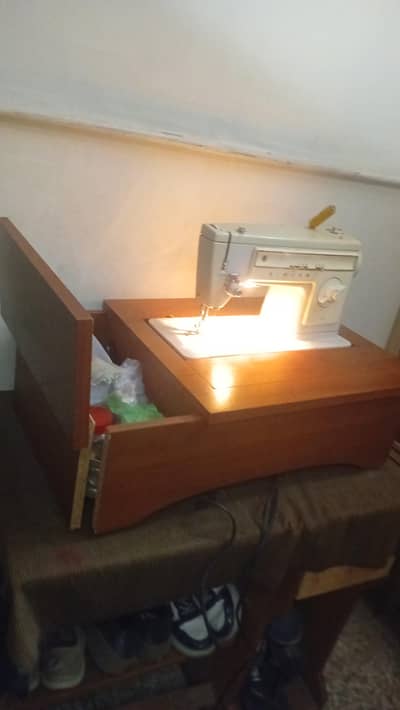 singer sewing machine  along  with motor