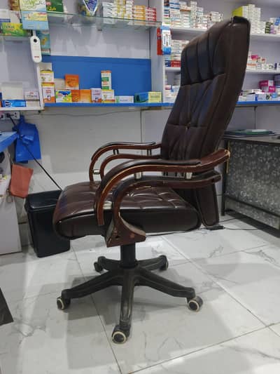 Office revolving chair brown leather