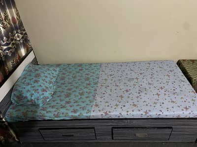 2 single bed one corner table and computer table