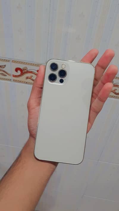 iPhone 12 pro 128 gb 90 battery health 10 by 9 locked to owner