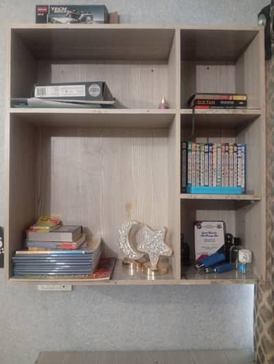 Book shelves, writing tables, and chairs