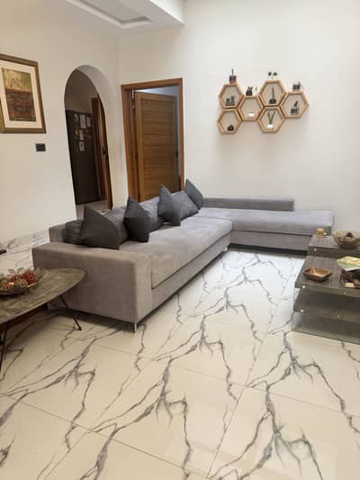 Interwood L shaped sofa for sale