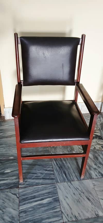 four leather chairs.