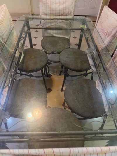 Glass Table and Iron Rods chairs