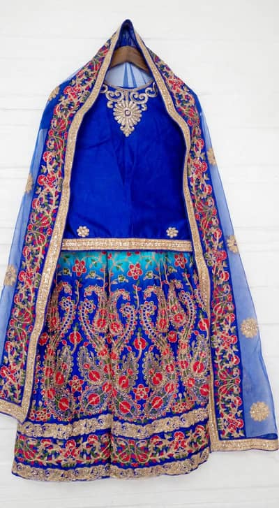 Royal blue heavy bridal lehenga 1 time used urgent sale 8500   only