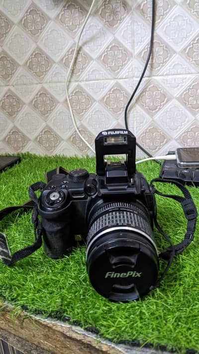 Brand: Fuji Flim FinPix  S 9500 with lenses