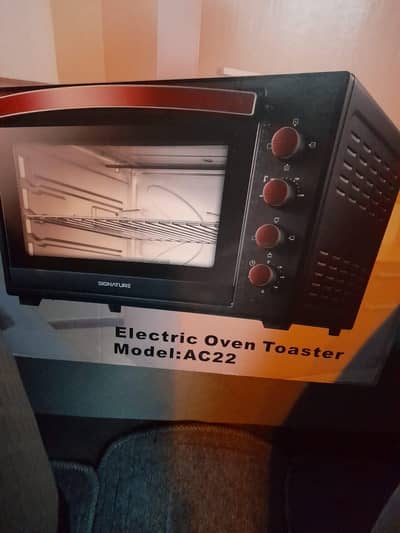 Brand new electric oven,Signature 65lit for sale. fix price