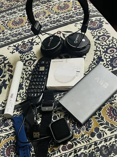 Powerbank  watch headphones remote brush