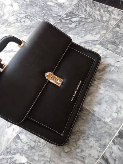 premium black leather handbag