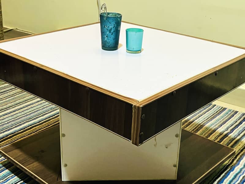Decent coffee table (2.5X2.5) 1