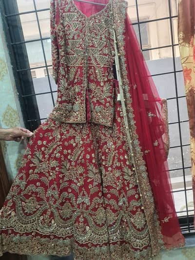 Elegant Deep Red Heavily embellished Pakistani Bridal Dress