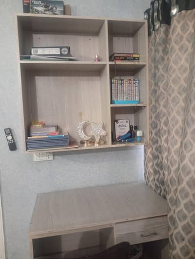 Bookshelves, Writing Tables, and Chairs