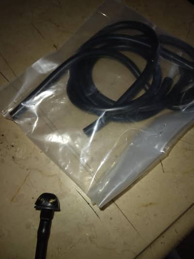 Wiper nozzle screen washer