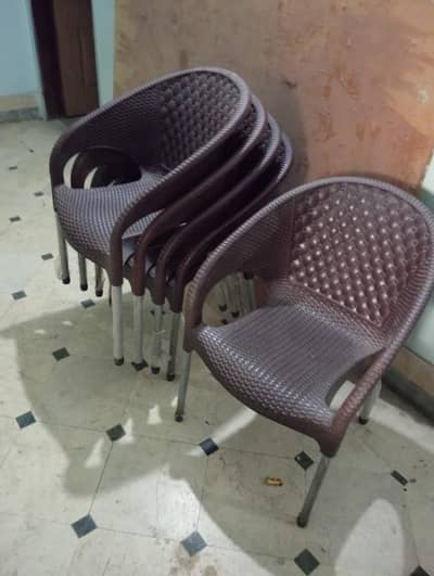 Plastic chairs Rattan Style with iron legs