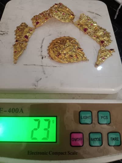 23 g nekles and Tikka 22 kairit gold