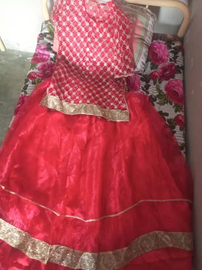 Red color lehnga for wedding event slightly used but best in condition