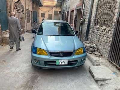 Honda City 2001 EXI Aqua blue - family Used - token paid till 2007