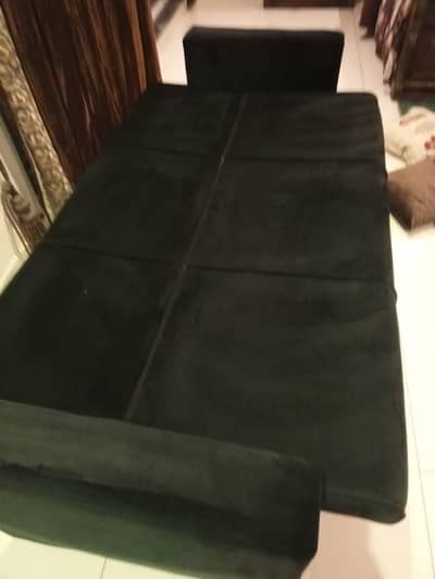 black sofa cum bed. . celete brand