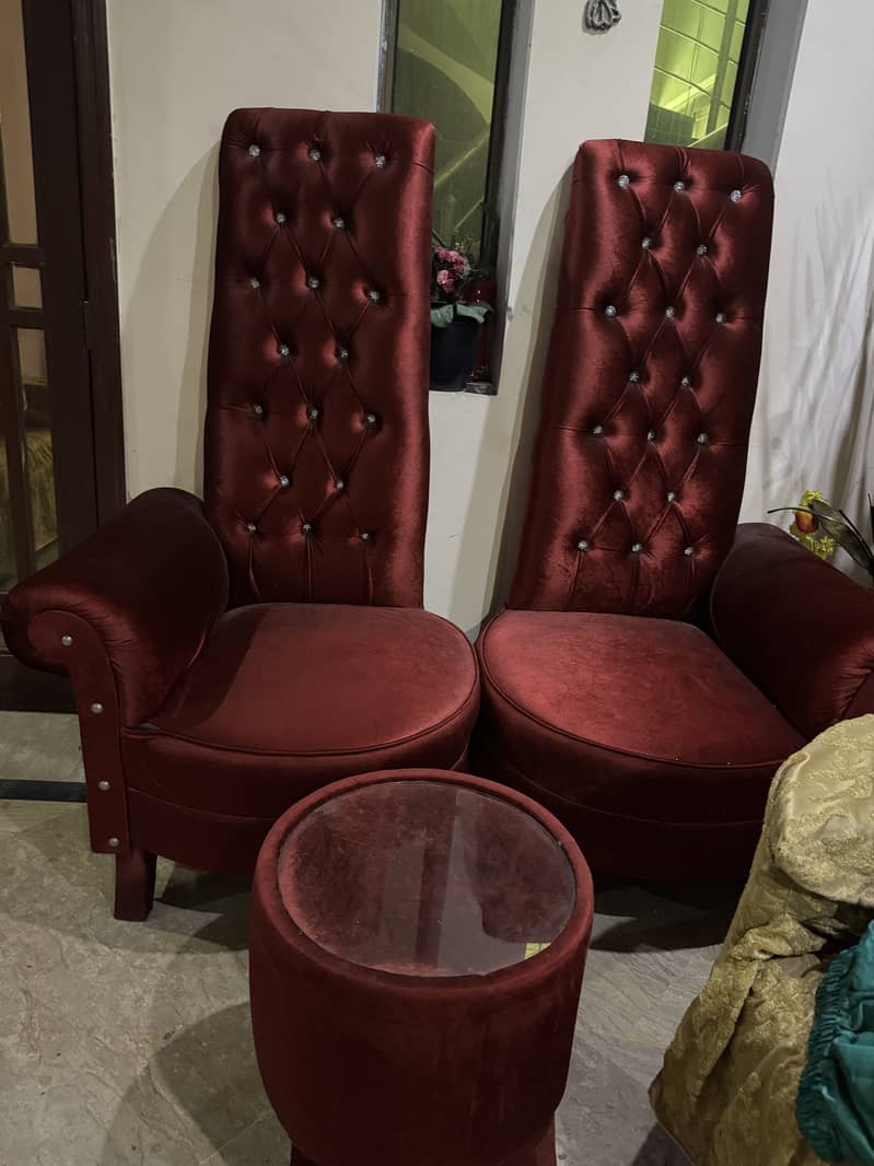 Two sofa chairs with one table 1