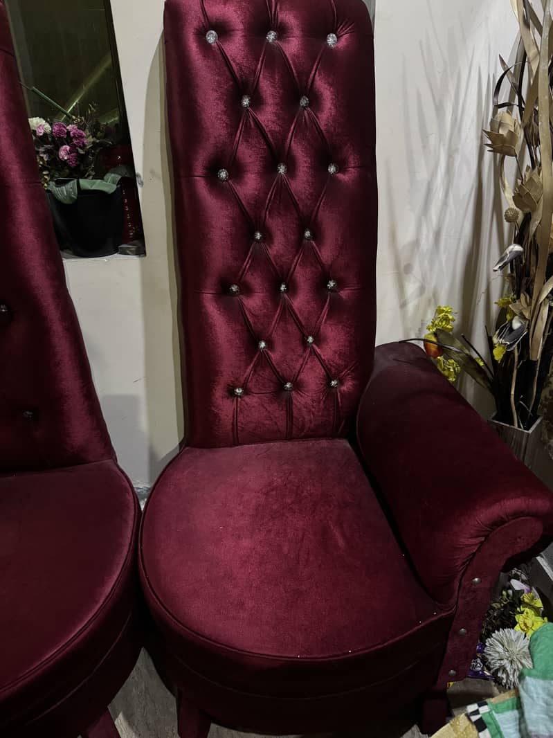 Two sofa chairs with one table 2