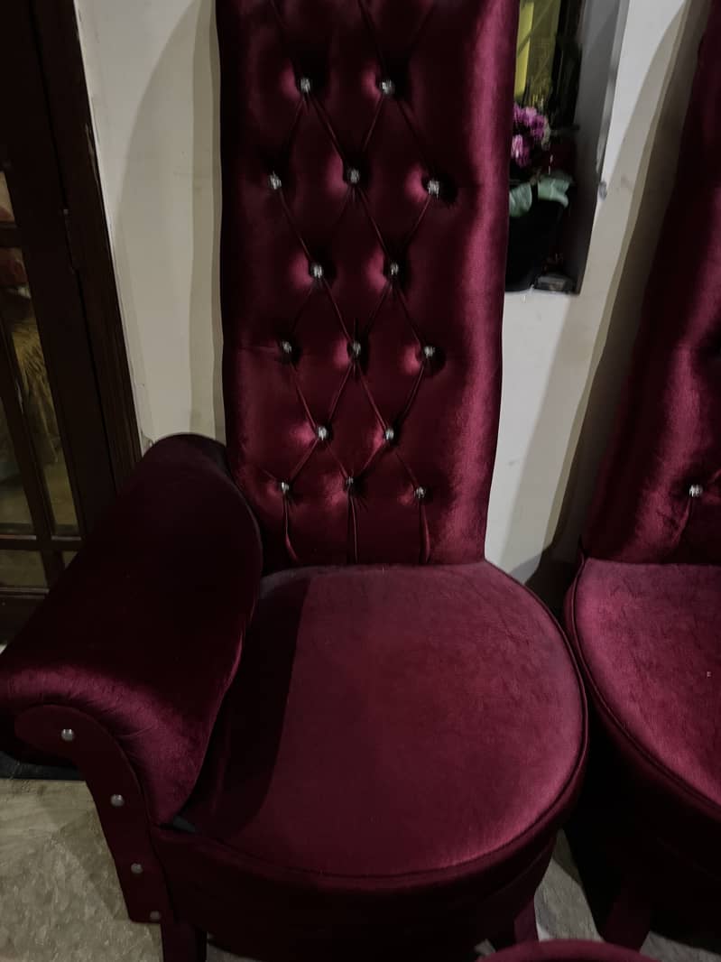 Two sofa chairs with one table 3