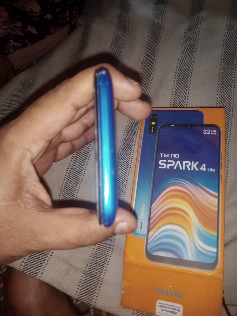 Tecno Spark 4 Lite 1
