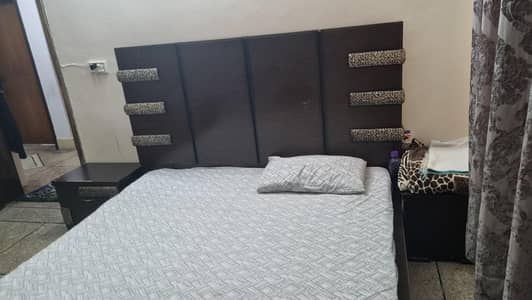 wooden double bed