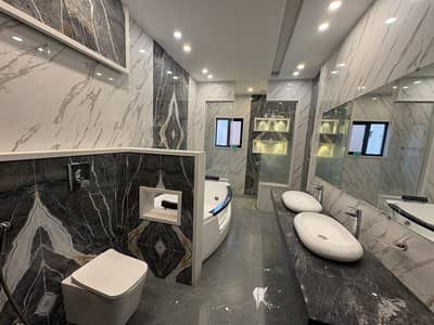 1 Kanal Modern Design House AC Installed For Rent In DHA Phase 5 Lahore.