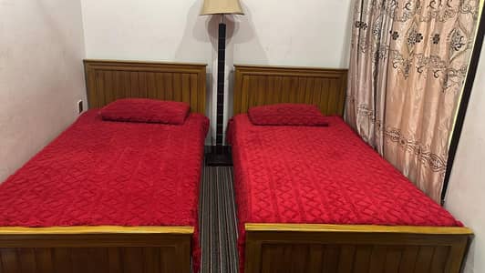 2  Wooden Single Beds With Mattresses