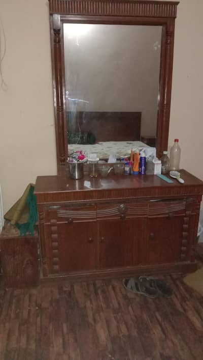 used bed and dressings and showcase