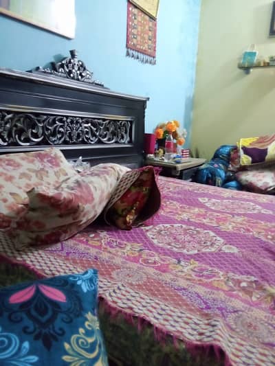 Wooden Bed with complementary Dresser