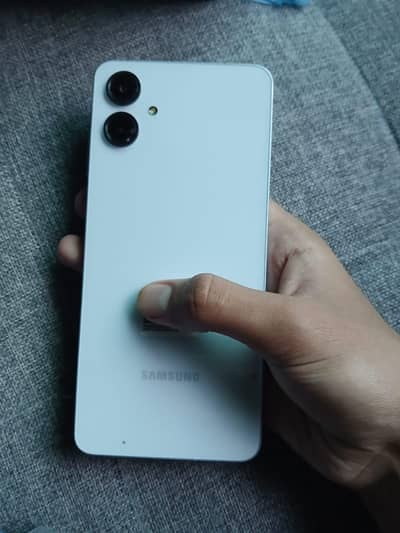 Two Samsung Mobile A06 (black and light blue)