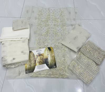 3 new unstiched suits in different brands single suit price 6500