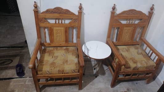 Two seater sofa/chairs with coffee table chinioti