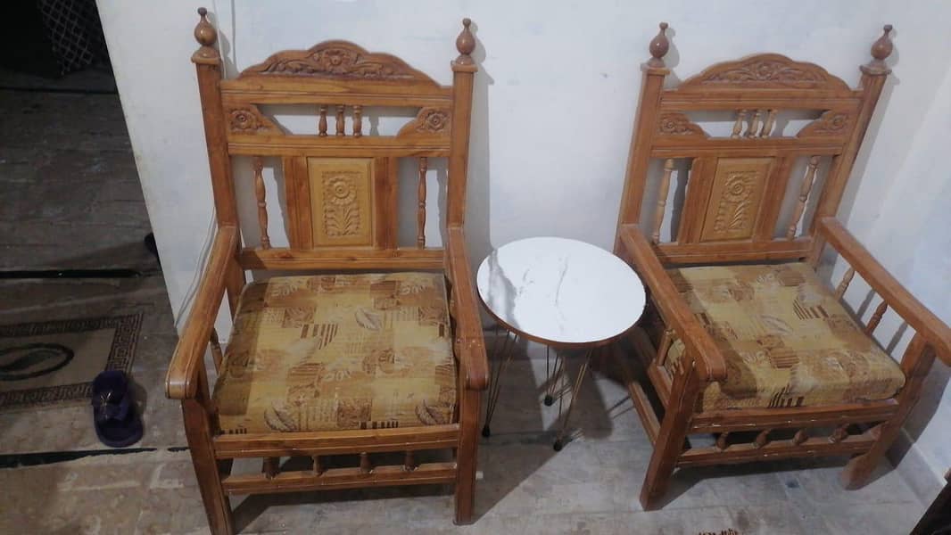 Two seater sofa/chairs with coffee table chinioti 0