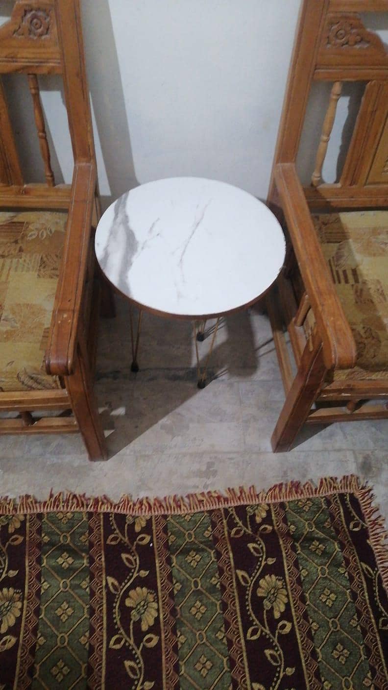Two seater sofa/chairs with coffee table chinioti 1