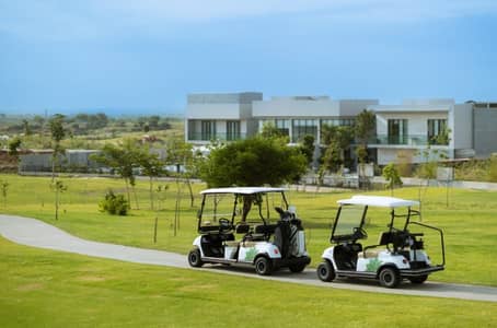 Eighteen:10 Marla Golf course facing corner plot with extra land for sale on installments