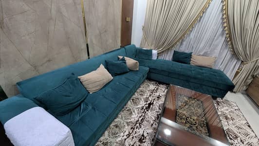Green L shape sofas