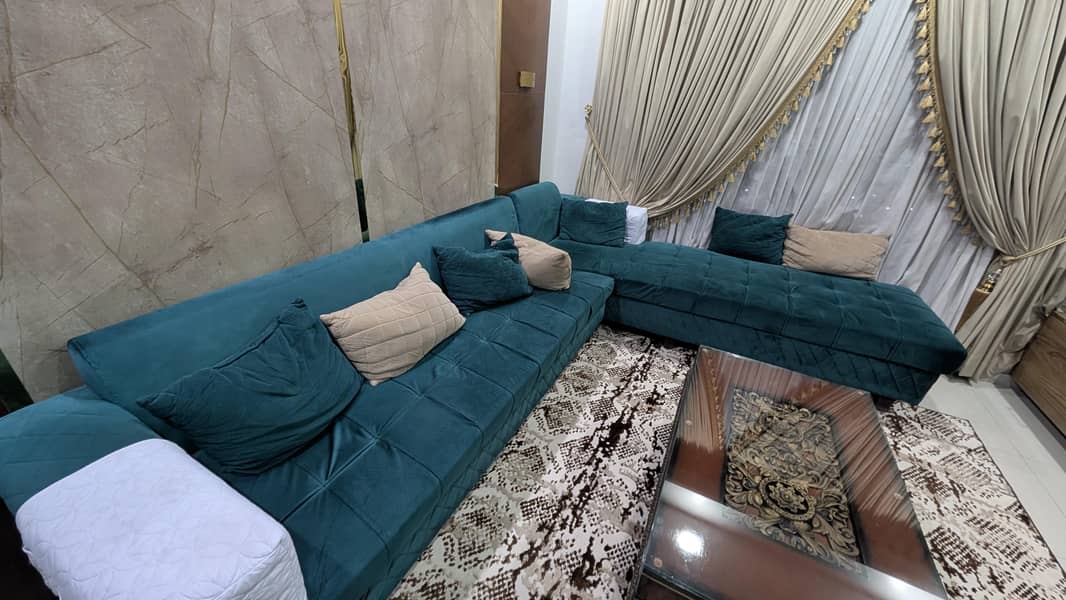 Green L shape sofas 0