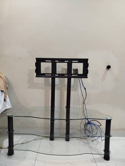 Tempered and transparent glass TV stand