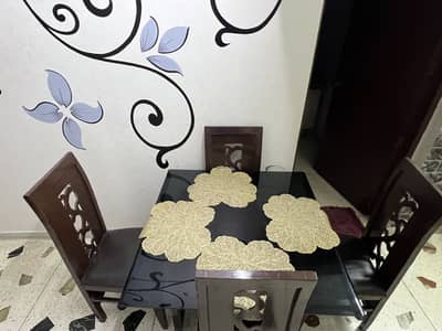 Used 4-Seater Glass Top Dining Table with 4 Chairs, Clean Condition