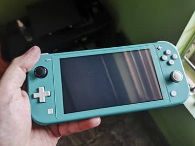 Nintendo Switch Lite (JB) With 15games
