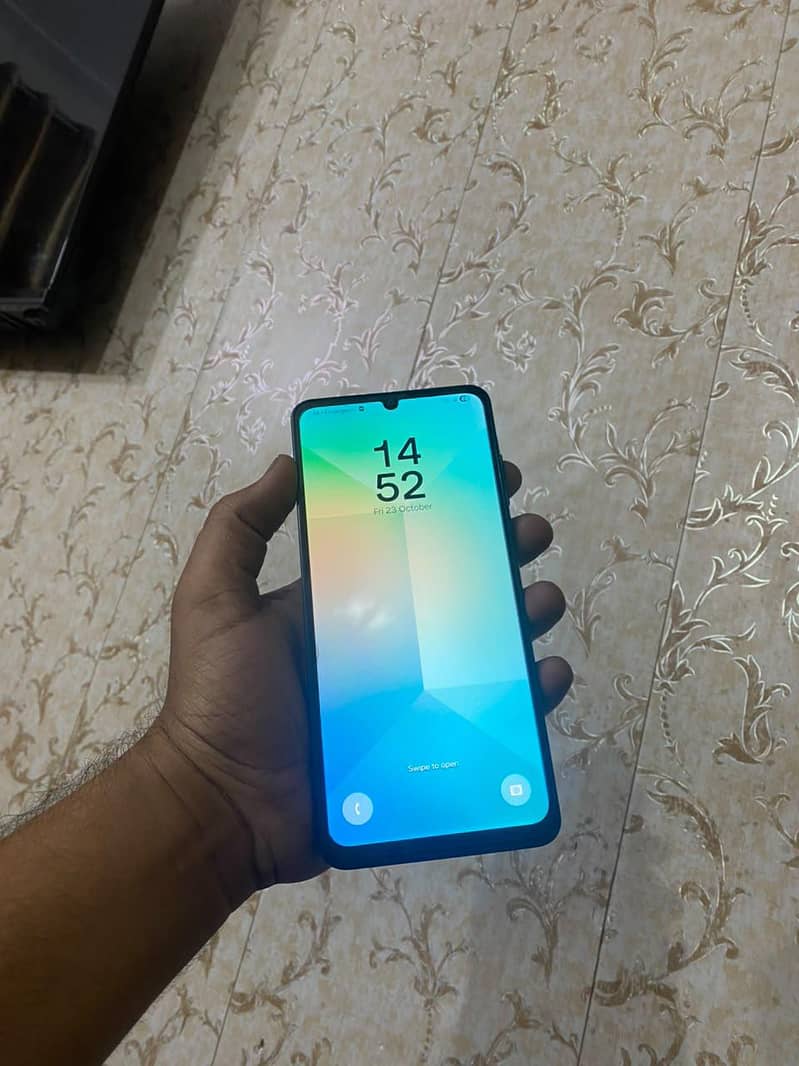 Samsung Mobile A06 1