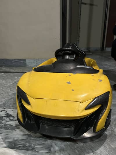 Low budget battery kids toy car
