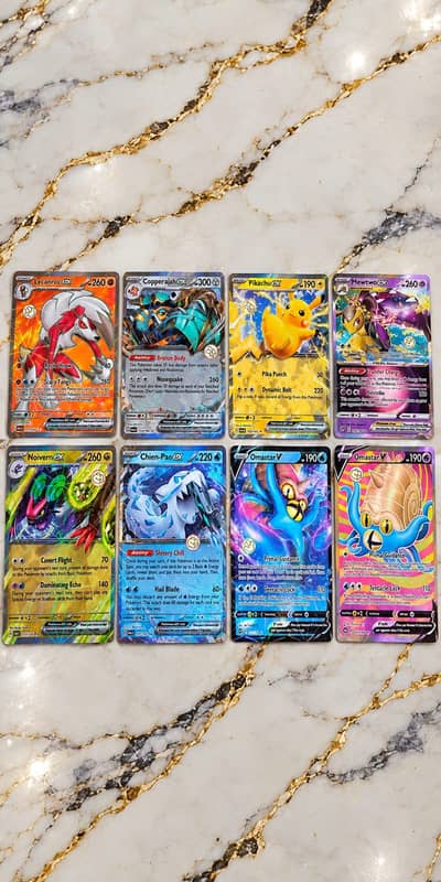 8 POKEMON cards bought in USA